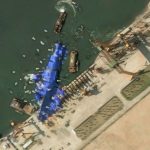 North Korea deploys mystery balloon-like objects to stricken warship, satellite photos show